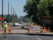 Crews on Tuesday afternoon remove unsuitable soils from underneath the roadway along Northeast 137th Avenue, stabilizing the new street and constructing a concrete culvert over the Burnt Bridge Creek. This road closure will last about 10 months.