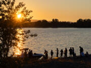 Residents pack the shoreline at Frenchman&rsquo;s Bar Regional Park on the last day of a summer heat wave that reached triple digits for multiple days on Tuesday evening.