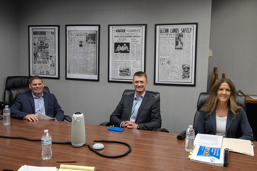 Clark Public Utilities commissioner candidates James Oneil, from left, Christopher Thobaben and Sherry Erickson meet with members of The Columbian&rsquo;s Editorial Board. The three candidates are vying to succeed Jim Malinowski, who is retiring from the board.