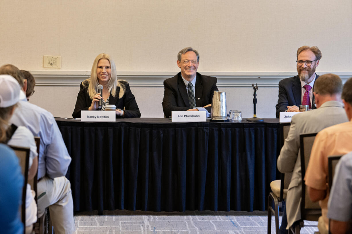 City manager finalists Nancy Newton, from left, Lon Pluckhahn and Jonathan Young answer questions during a candidate forum .