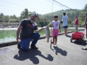 Pacific Power and the Washington Department of Fish and Wildlife hosted a fishing event for children with disabilities July 13 at Merwin Hatchery near Woodland.