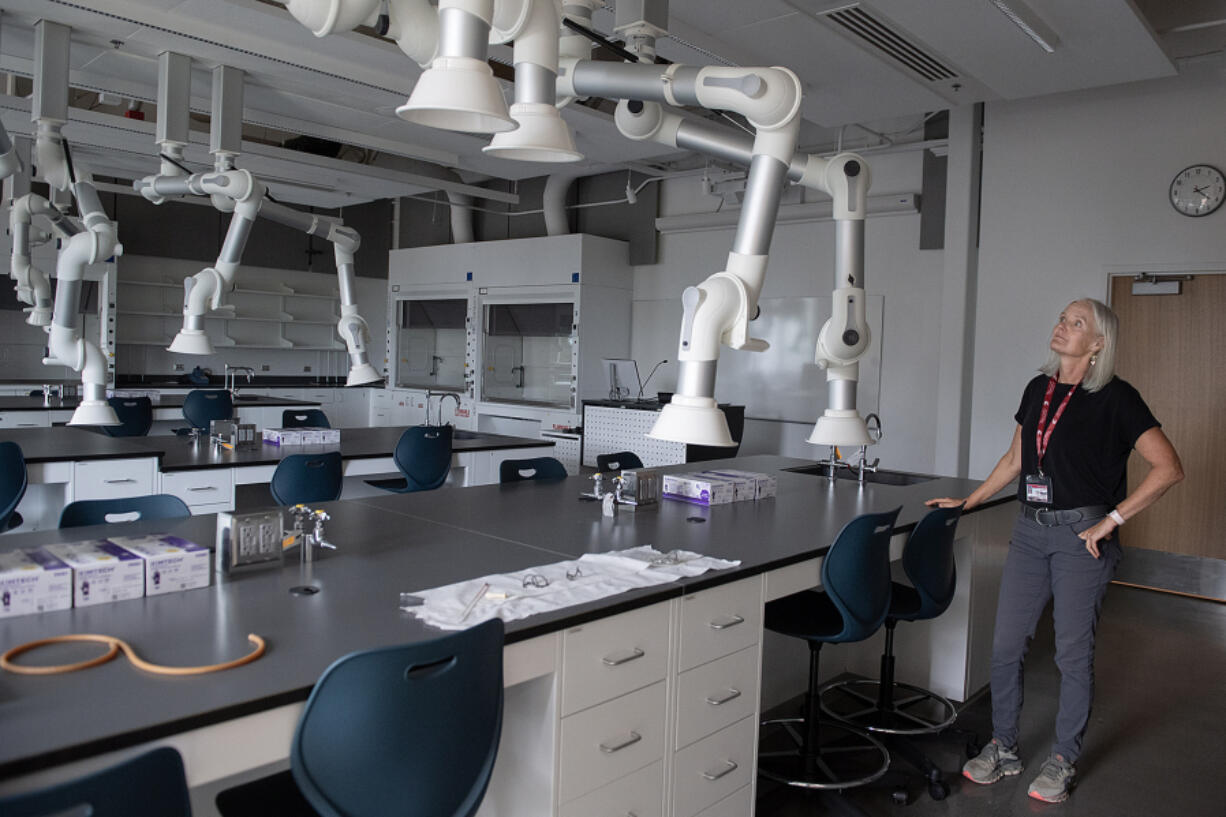 Christine Portfors, Washington State University Vancouver vice chancellor for research and graduate education, visits a chemistry lab in the new Life Sciences building Thursday afternoon. With added lab and classroom space, the campus is able to add a chemistry major.