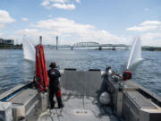 Water sprays out of cannons on the front of Vancouver Fire Boat 1 on Monday on the Columbia River. In the 10 years the department has had the boat, development along Vancouver&rsquo;s waterfront has increased the need for the emergency response vessel.