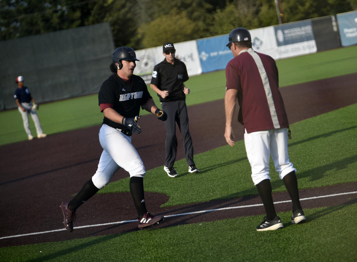 Hunter Katschke of the Ridgefield Raptors rounds the bases after hitting a two-run home run against the Victoria HarbourCats in a West Coast League game at the Ridgefield Outdoor Recreation Center on Saturday, July 20, 2024 (Tim Martinez/The Columbian)