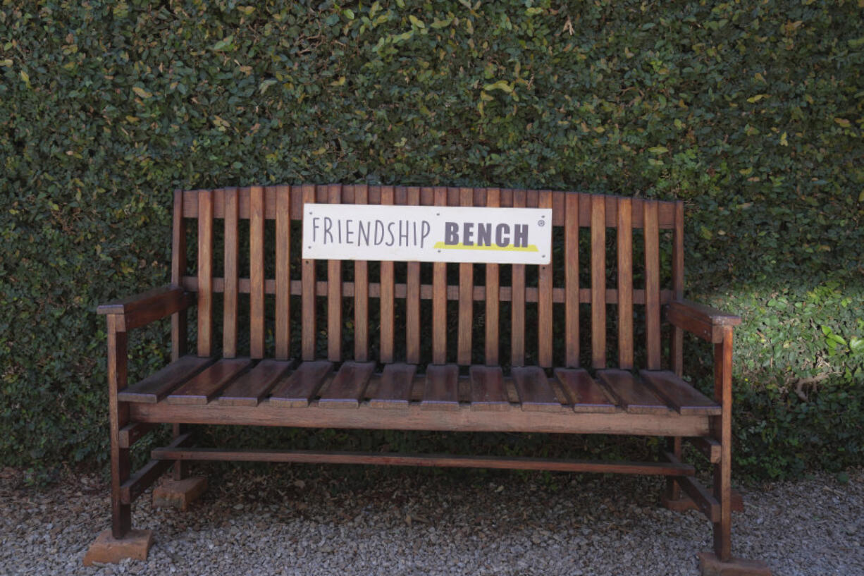 An empty bench is seen outside the Friendship Bench offices in Harare, Zimbabwe, Saturday, May 4, 2024. In Zimbabwe, talk therapy involving park benches and a network of grandmothers has become a saving grace for people with mental health issues. Now the concept is being adopted in parts of the United States and elsewhere.