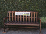 An empty bench is seen outside the Friendship Bench offices in Harare, Zimbabwe, Saturday, May 4, 2024. In Zimbabwe, talk therapy involving park benches and a network of grandmothers has become a saving grace for people with mental health issues. Now the concept is being adopted in parts of the United States and elsewhere.