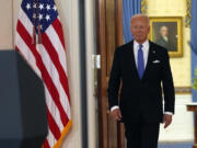 President Joe Biden arrives to speak in the Cross Hall of the White House Monday, July 1, 2024, in Washington.