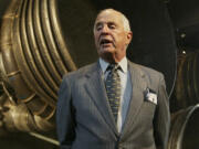 FILE - Apollo 8 Lunar Module Pilot Gen. William Anders, speaks to reporters in front of the Saturn 5 Aft End, the F-1 rocket engines of the first stage of the Apollo 11/Saturn 5 launch vehicle ,July 20, 2004, in Washington. The National Transportation Safety Board has released its preliminary investigation into the fatal plane crash of the former astronaut.