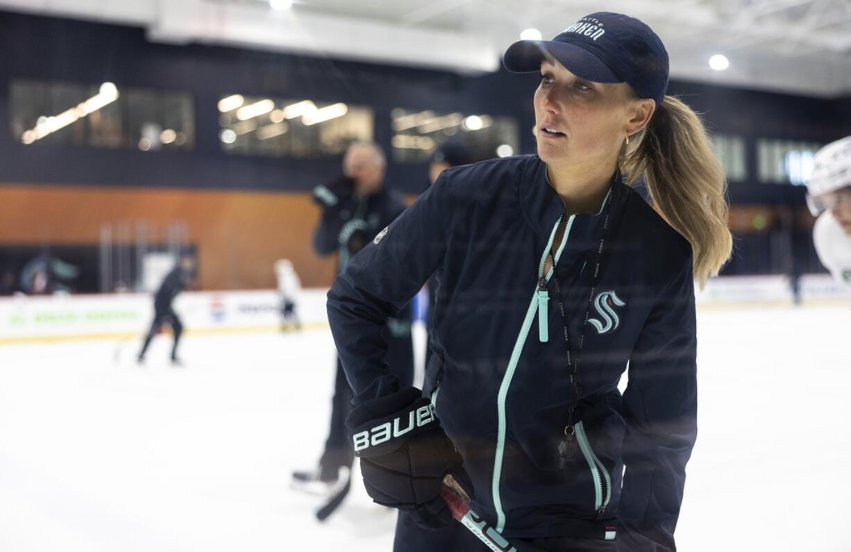 Jessica Campbell runs a drill during a Seattle Kraken rookie development camp on Tuesday, July 2, 2024, in Seattle. Campbell will become the first woman to work on the bench of an NHL franchise after the Seattle Kraken hired her as an assistant coach Wednesday, July 3, 2024.