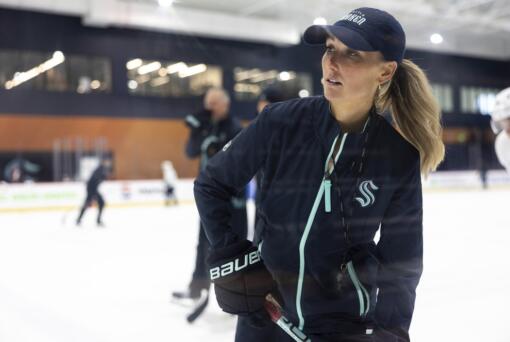 Jessica Campbell runs a drill during a Seattle Kraken rookie development camp on Tuesday, July 2, 2024, in Seattle. Campbell will become the first woman to work on the bench of an NHL franchise after the Seattle Kraken hired her as an assistant coach Wednesday, July 3, 2024.
