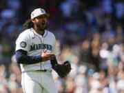 Seattle Mariners relief pitcher Andrés Muñoz reacts after the final out in a win over the Baltimore Orioles in a baseball game Thursday, July 4, 2024, in Seattle.