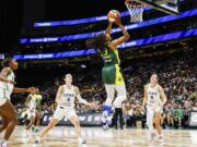 Seattle Storm's Nneka Ogwumike scores against Minnesota Lynx in the second quarter during a WNBA Basketball on Friday, July 12, 2024 at Climate Pledge Arena, in Seattle, (Dean Rutz/The Seattle Times via AP)