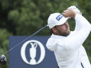 Daniel Brown of England hits off the 12th tee during his opening round of the British Open Golf Championships at Royal Troon golf club in Troon, Scotland, Thursday, July 18, 2024.