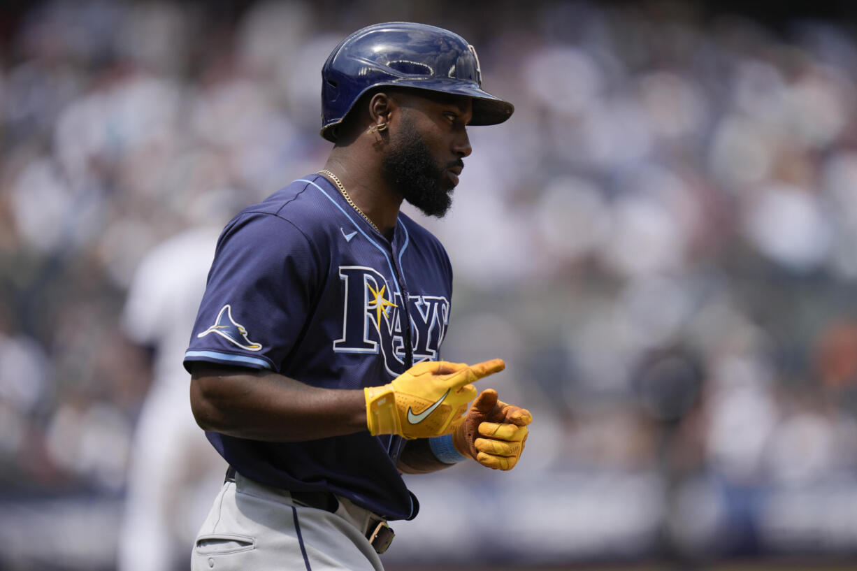 Tampa Bay Rays' Randy Arozarena reacts after hitting a solo home run during the fourth inning of the baseball game against the New York Yankees at Yankee Stadium Sunday, July 21, 2024, in New York.