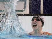 Katie Ledecky, of the United States, celebrates after winning the women's 1500-meter freestyle final at the 2024 Summer Olympics, Wednesday, July 31, 2024, in Nanterre, France.