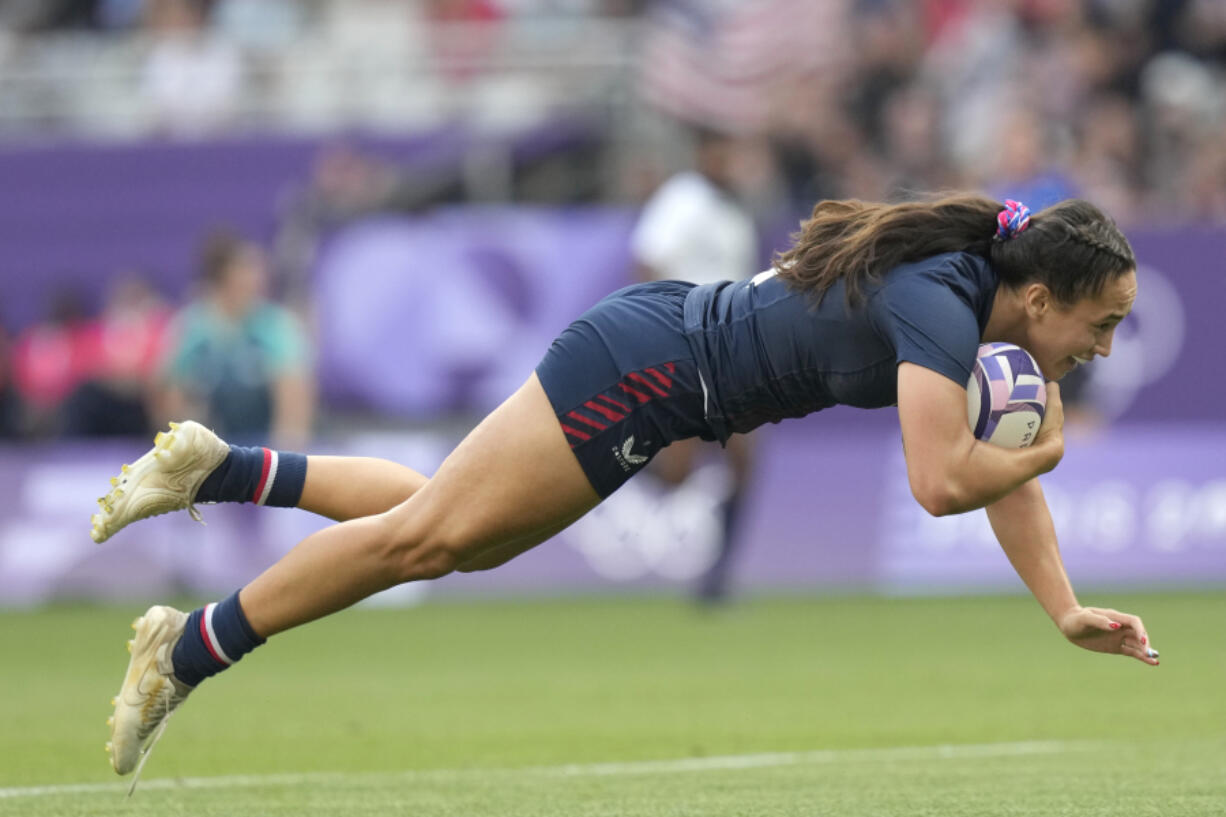 United States&rsquo; Alex Sedrick scores the winning try during the women&rsquo;s bronze medal Rugby Sevens match between the United States and Australia at the 2024 Summer Olympics, in the Stade de France, in Saint-Denis, France, Tuesday, July 30, 2024. The US won the match 14-12.