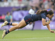 United States&rsquo; Alex Sedrick scores the winning try during the women&rsquo;s bronze medal Rugby Sevens match between the United States and Australia at the 2024 Summer Olympics, in the Stade de France, in Saint-Denis, France, Tuesday, July 30, 2024. The US won the match 14-12.