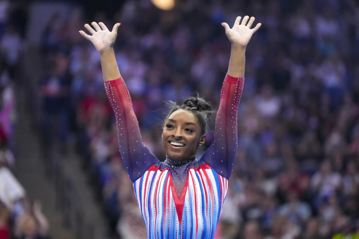 Simone Biles smiles after competing in the floor exercise at the United States Gymnastics Olympic Trials on Sunday, June 30, 2024, in Minneapolis.