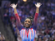 Simone Biles smiles after competing in the floor exercise at the United States Gymnastics Olympic Trials on Sunday, June 30, 2024, in Minneapolis.