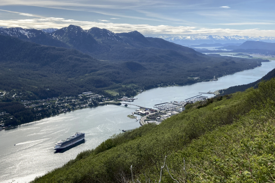 FILE - A cruise ship departs from downtown Juneau, on June 7, 2023, along the Gastineau Channel, in Alaska. Voters in Alaska&rsquo;s capital city could decide in October whether to ban large cruise ships on Saturdays starting next year.