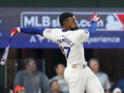 National League&rsquo;s Teoscar Hern&aacute;ndez, of the Los Angeles Dodgers, follows through during the MLB baseball All-Star Home Run Derby, Monday, July 15, 2024, in Arlington, Texas.