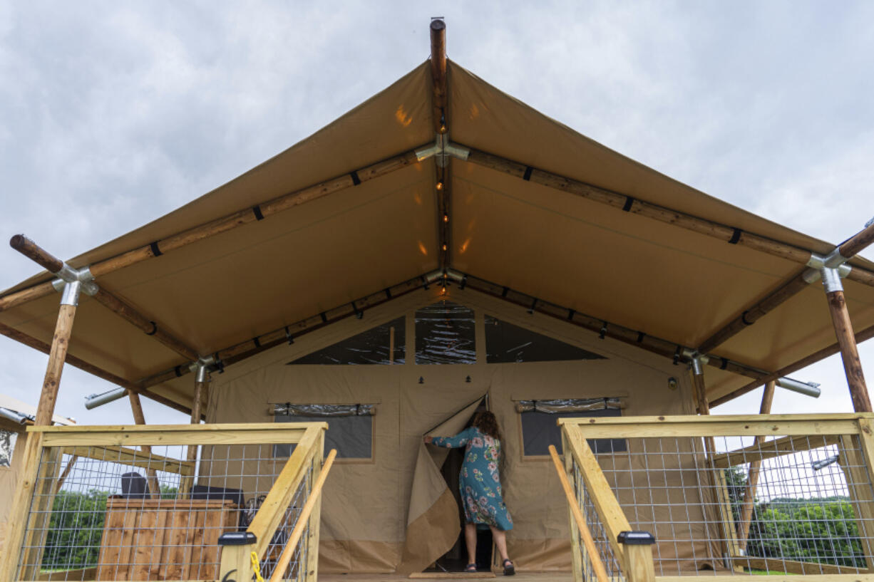 Beverly &ldquo;Cookie&rdquo; Grant enters her glamping tent June 14 at Bethel Woods Center for the Arts, the site of Woodstock Music and Art Fair in Bethel, N.Y.