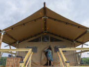 Beverly &ldquo;Cookie&rdquo; Grant enters her glamping tent June 14 at Bethel Woods Center for the Arts, the site of Woodstock Music and Art Fair in Bethel, N.Y.