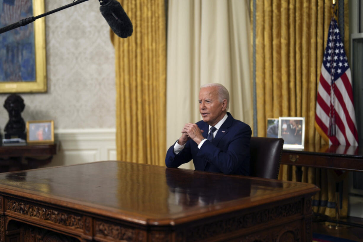 President Joe Biden addresses the nation from the Oval Office of the White House in Washington, Sunday, July 14, 2024, about the assassination attempt of Republican presidential candidate former President Donald Trump at a campaign rally in Pennsylvania.