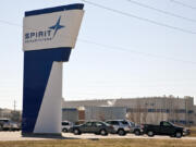 FILE - The Spirit AeroSystems sign is pictured, July 25, 2013, in Wichita, Kan. Boeing announced plans late Sunday, June 30, 2024, to acquire Spirit AeroSystems for $4.7 billion in an all-stock transaction for the manufacturing firm.