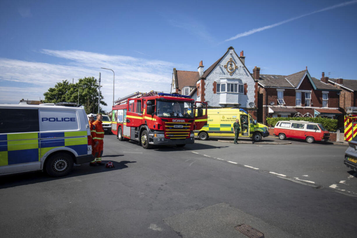 Emergency services work at the scene in Southport, Merseyside, where a man has been detained and a knife has been seized after a number of people were injured in a reported stabbing, Monday July 29, 2024.