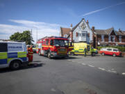 Emergency services work at the scene in Southport, Merseyside, where a man has been detained and a knife has been seized after a number of people were injured in a reported stabbing, Monday July 29, 2024.