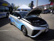 FILE - A 2021 Toyota Prius that runs on a hydrogen fuel cell sits on display at the Denver auto show on Sept. 17, 2021, at Elitch&rsquo;s Gardens in downtown Denver. California will be the first state to receive federal funds under a program to create regional networks, or &ldquo;hubs,&rdquo; that produce hydrogen as an energy source for vehicles, manufacturing and generating electricity, officials announced Wednesday, July 17, 2024.