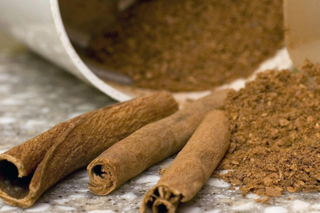 FILE - Stick and ground cinnamon is displayed for a photograph in Concord, N.H., on March 2, 2008.  U.S. health officials are warning, Wednesday, July 31, 2024, that several types of ground cinnamon sold at certain discount and specialty grocery stores are contaminated with high levels of lead.