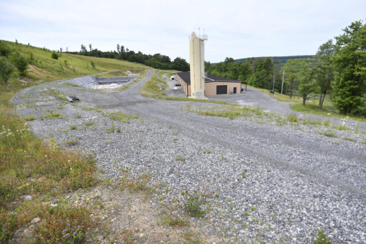 West Virginia University&rsquo;s Water Research Institute runs this facility where rare earth minerals are separated from acidic groundwater draining from an abandoned coal mine, June 25, 2024, in Mount Storm, W.Va. Researchers are finding that groundwater pouring out of this and other abandoned coal mines contains the rare earth elements and other valuable metals that are vital to making everything from electric vehicle motors to rechargeable batteries to fighter jets smaller, lighter or more powerful.