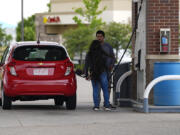 Motorists fill up the tank of a car at a gasoline station on Tuesday, June 25, 2024, in Loveland, Colo. On Thursday, July 11, 2024, the Labor Department issues its report on inflation at the consumer level in June.