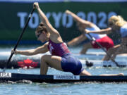 FILE - Nevin Harrison, of the United States, competes in the women&rsquo;s canoe single 200m final at the 2020 Summer Olympics, Thursday, Aug. 5, 2021, in Tokyo, Japan. Harrison is 22 years old and the defending Olympic gold medalist in canoe 200 sprint. She is a rock star in her sport and a certain threat to get back on the podium at the Paris Games.