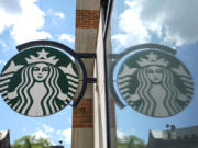 FILE - A sign at a Starbucks is displayed in Philadelphia, Wednesday, May 1, 2024. Starbucks reports earnings on Tuesday, July 30, 2024.