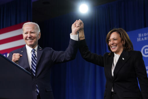 FILE - President Joe Biden and Vice President Kamala Harris stand on stage at the Democratic National Committee winter meeting, Feb. 3, 2023, in Philadelphia.