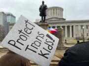 FILE - Demonstrators advocating for transgender rights and healthcare stand outside of the Ohio Statehouse, Jan. 24, 2024, in Columbus, Ohio. A federal appeals court on Wednesday, July 17, refused to lift a judge&#039;s order temporarily blocking the Biden administration&rsquo;s new Title IX rule meant to expand protections for LGBTQ+ students.