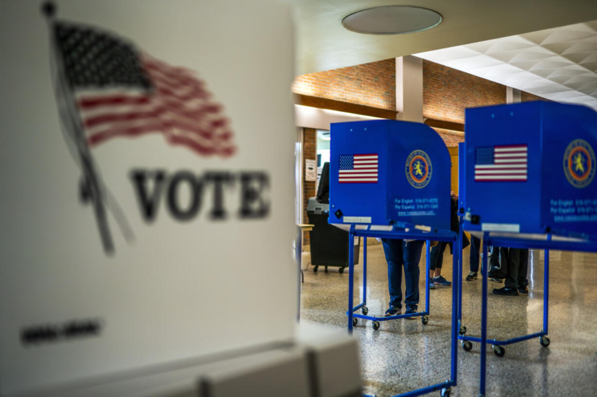 FILE - A voting center is pictured during early voting in the states&#039; presidential primary election, March 26, 2024, in Freeport, N.Y. Even before President Joe Biden&#039;s withdrawal from the 2024 presidential race, allies of former President Donald Trump floated the possibility of suing to block Democrats from having anyone other than Biden on the ballot in November.