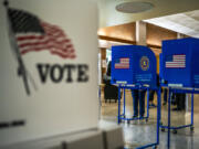 FILE - A voting center is pictured during early voting in the states&#039; presidential primary election, March 26, 2024, in Freeport, N.Y. Even before President Joe Biden&#039;s withdrawal from the 2024 presidential race, allies of former President Donald Trump floated the possibility of suing to block Democrats from having anyone other than Biden on the ballot in November.
