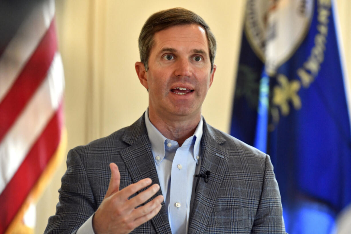 Kentucky Gov. Andy Beshear speaks during an interview at the Kentucky State Capitol in Frankfort, Ky., Monday, July 22, 2024. (AP Photo/Timothy D.