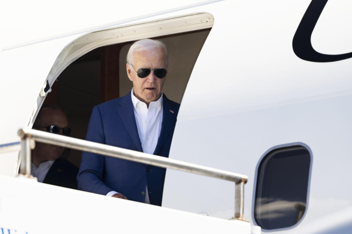 President Joe Biden disembarks Air Force One upon arrival at Andrews Air Force Base, Md., from a campaign trip to Pennsylvania Sunday, July 7, 2024.