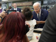 President Joe Biden greets people as he visits Mario&rsquo;s Westside Market in Las Vegas, Tuesday, July 16, 2024.