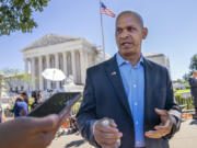 FILE - Former U.S. Capitol Police Sgt. Aquilino Gonell, who defended the Capitol on Jan. 6, is interviewed outside of the Supreme Court, July 1, 2024, after the court decision o the immunity case of former President Donald Trump, in Washington.