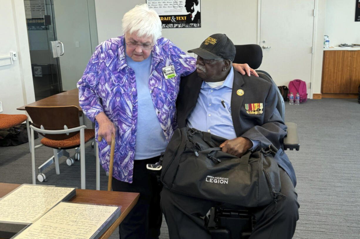 Joan Browning and Charles Person chat at Emory University in Atlanta, Fridy, July 26, 2024. They were Freedom Riders. activists who rode buses into the Deep South in 1961, aiming to desegregate interstate transportation. Browning and Person are donating their archives to the university&rsquo;s Rose Library.