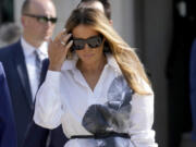 FILE - Former first lady Melania Trump leaves after voting in the Florida primary election in Palm Beach, Fla., March 19, 2024. After Melania Trump missed key events in her husband&rsquo;s campaign, she told reporters asking about her thin schedule to &ldquo;stay tuned.&rdquo; But in the months since, she has largely refrained from public appearances.