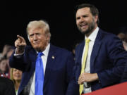 Republican presidential candidate former President Donald Trump and Republican vice presidential candidate Sen. JD Vance, R-Ohio, attend the 2024 Republican National Convention at the Fiserv Forum, Tuesday, July 16, 2024, in Milwaukee.