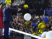 Republican presidential candidate former President Donald Trump stands on stage with former first lady Melania Trump during the final day of the Republican National Convention at the Fiserv Forum, Thursday, July 18, 2024, in Milwaukee.