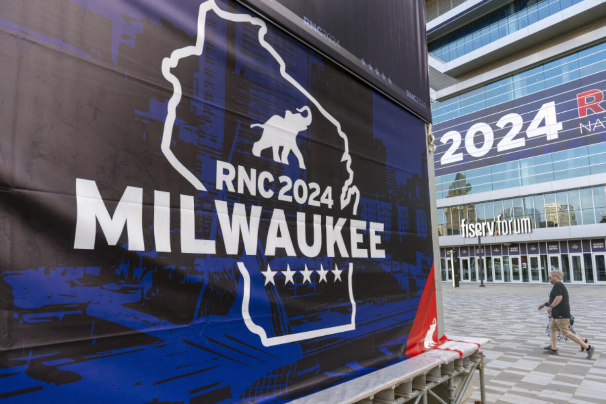 FILE - People walk past the Fiserv Forum ahead of the 2024 Republican National Convention, July 11, 2024, in Milwaukee. The Republican National Convention kicks off Monday, July 15, with delegates and officials descending on Wisconsin, a key battleground state, to formally nominate former President Donald Trump as the GOP nominee. The RNC will livestream proceedings across a number of online platforms, including YouTube and X. A number of networks have announced special programming for the convention&rsquo;s primetime evening portions, and other media outlets, both local and national, will stream whatever is happening on the floor.